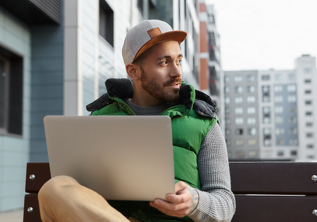 Zavians SEO expert working on a laptop